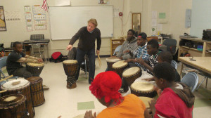 Youth drumming with Randy Armstrong